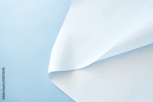  a close up of a white sheet of paper with a light blue back ground and a light blue back ground with a light blue back ground and a light blue back ground.