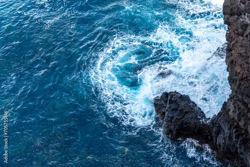 Waves crashing on volcanic rocks on Madeira © Niklas