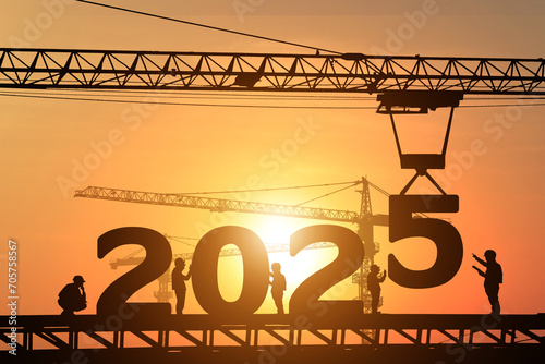 Silhouette staff works as a to prepare to welcome the new year 2025