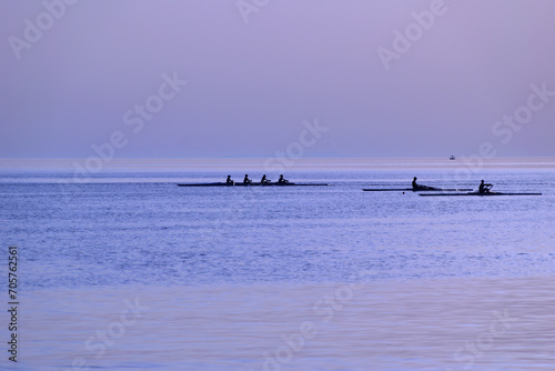 rowing (skiff) at sunset - Paralia Richa Nera (beach), Myrina, Lemnos island, Greece, Aegean sea