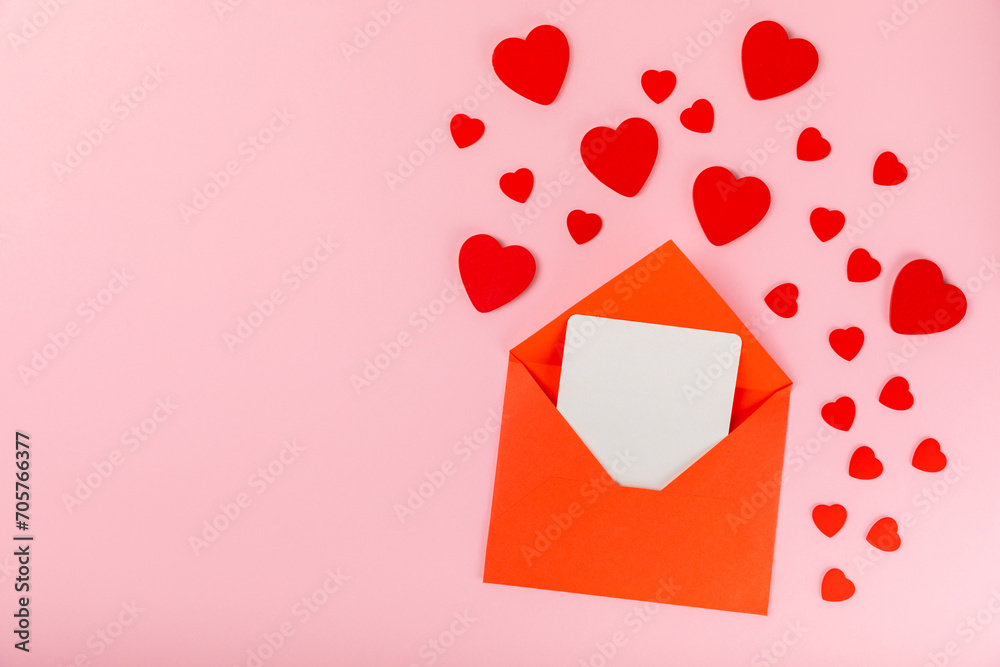 Valentine's Day concept. Valentine's Day background. Gifts, candles, confetti, envelope - postcard on a pink background. Flatley, top view, copy space.Valentine's day celebration Valentine's Day concept. Valentine's Day background. Gifts, candles, confetti, envelope - postcard on a pink background. Flatley, top view, copy space.Valentine's day celebration