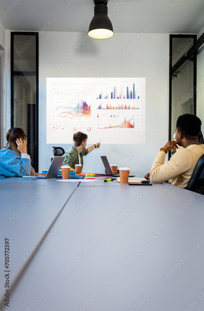 Fototapeta premium Diverse group of young business people working on new project together in office.