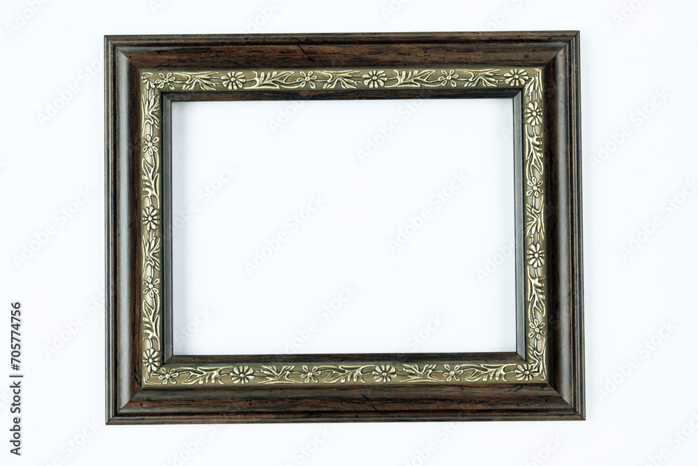 The frame is brown, the frame is brown with a small pattern on a white background. The frame is brown, the frame is brown with a small pattern on a white background.