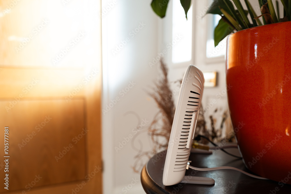 Shallow focus of a generic, dual-band WiFi broadband router seen on a ...