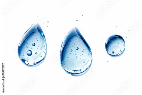 Set of three 3 water round droplets isolated on white background