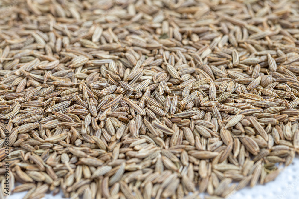 Cumin Jeera spice background. close-up view of zira. Cumin seeds from above. High angle photo of zira jeera cumin spices Cumin Jeera spice background. close-up view of zira. Cumin seeds from above. High angle photo of zira jeera cumin spices