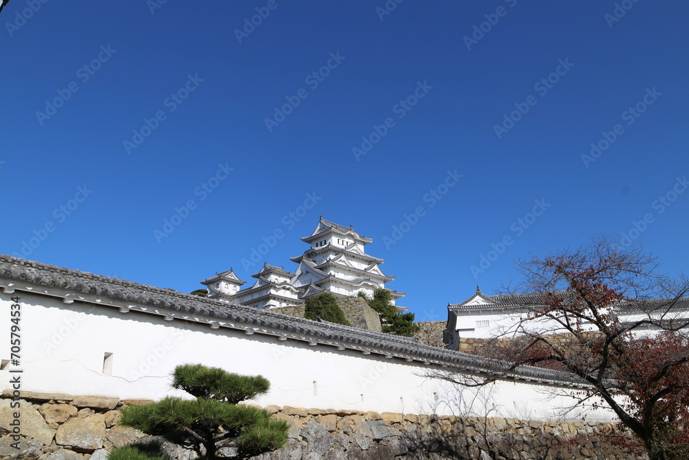 Himeji Castle and clear blue sky viewed from Hishinomon Gate in Himeji, Japan Himeji Castle and clear blue sky viewed from Hishinomon Gate in Himeji, Japan