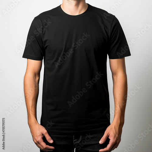 design for clothes shop, man in black t shirt. simple plain wear. tshirt with no letters. back view