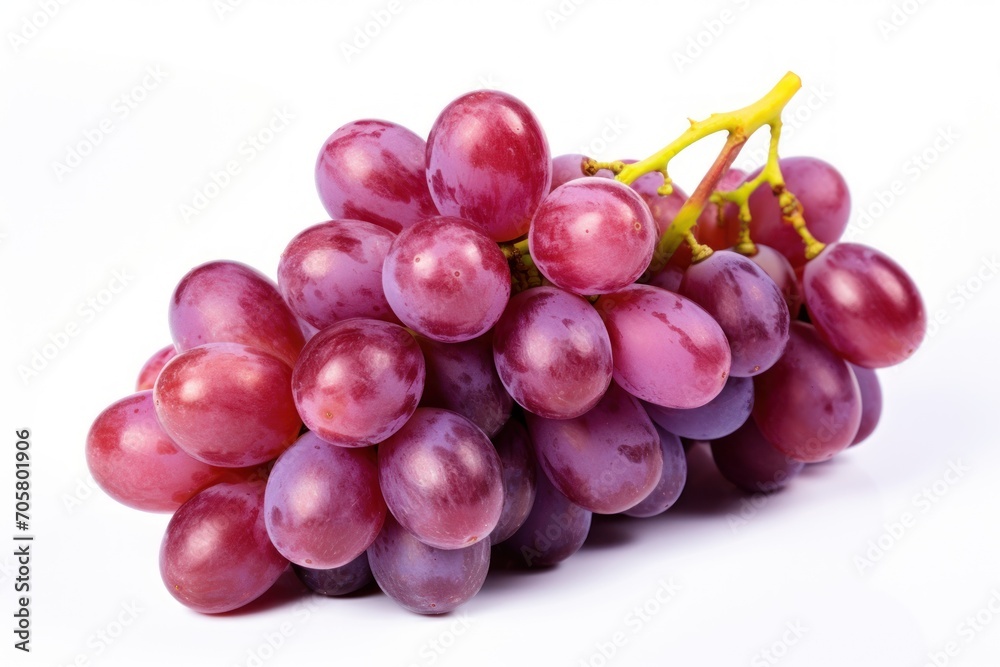 a bunch of grapes sitting on top of each other on top of a white surface with a yellow stem sticking out of the top of the bunch of the grapes. a bunch of grapes sitting on top of each other on top of a white surface with a yellow stem sticking out of the top of the bunch of the grapes.