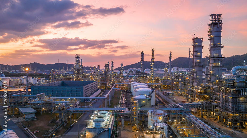 Oil and gas industrial refinery at twilight, Oil refinery and Petrochemical plant pipeline steel, Refinery factory oil storage tank and pipeline steel at night. - obrazy, fototapety, plakaty 