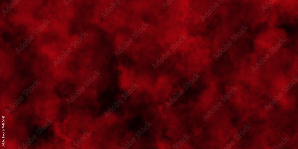Red powder explosion cloud on black background.abstract Halloween or Christmas cloudy banner,used as a background in abstract style.
