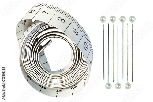 Fotografija Measuring tape and needles with a decorative head in the shape of a ball, isolated on a transparent background