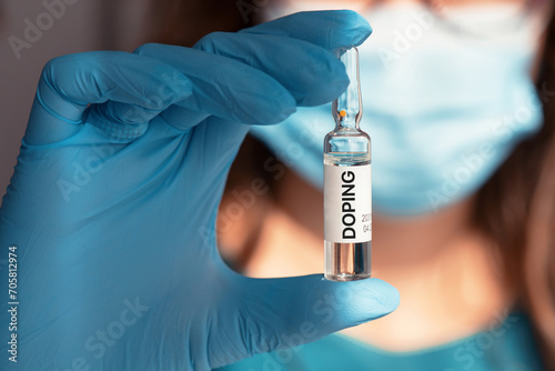 A doping ampoule in a nurse's hand photo