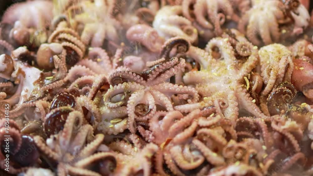 Octopuses are fried with onions in butter.