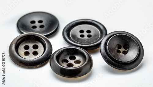 close up of black sewing buttons old button on white background sewing concept clipping path