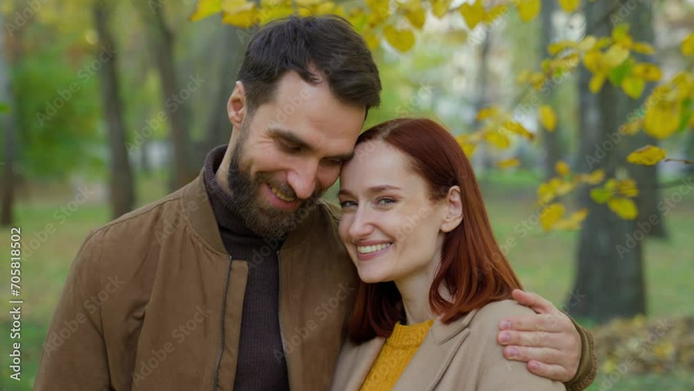 Happy smile positive carefree Caucasian man woman husband wife girlfriend boyfriend love dating outdoors nature couple smiling hugging looking at camera in autumn park romantic together yellow foliage Happy smile positive carefree Caucasian man woman husband wife girlfriend boyfriend love dating outdoors nature couple smiling hugging looking at camera in autumn park romantic together yellow foliage