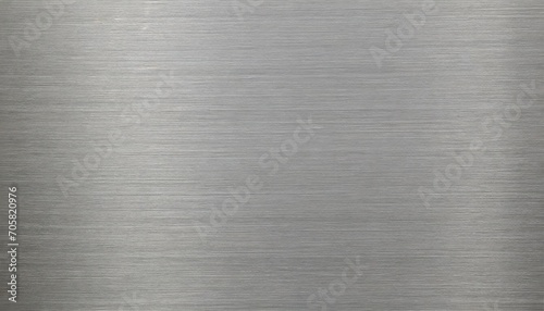 Silver metal texture of brushed stainless steel plate with the reflection of light. photo