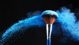 make up brush with blue powder explosion on black background