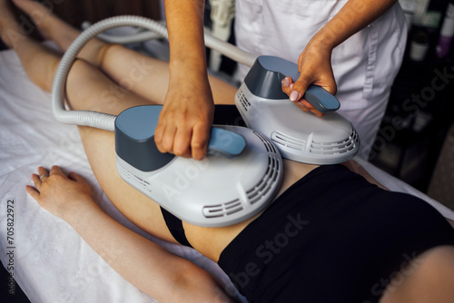 Photos Woman getting treatment on buttocks to burn fat, build muscles and remove cellulite