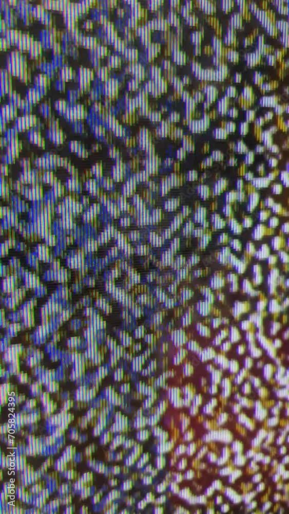 Close up view at a plasma tv while showing noise activity.
