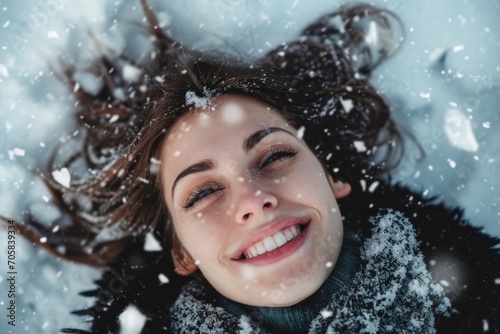 Beautiful Happy Woman Lying In The Snow