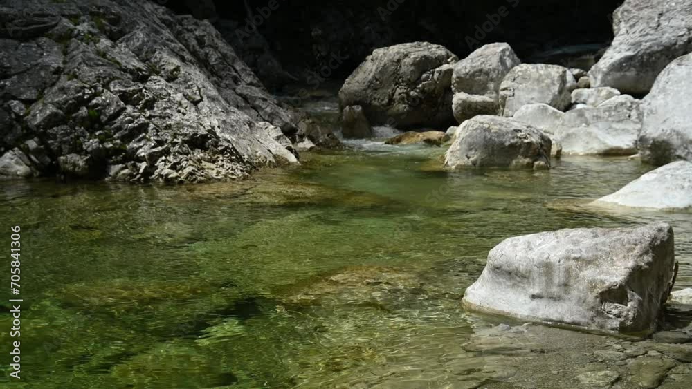 Pond of a stony mountain stream with clean water Pond of a stony mountain stream with clean water