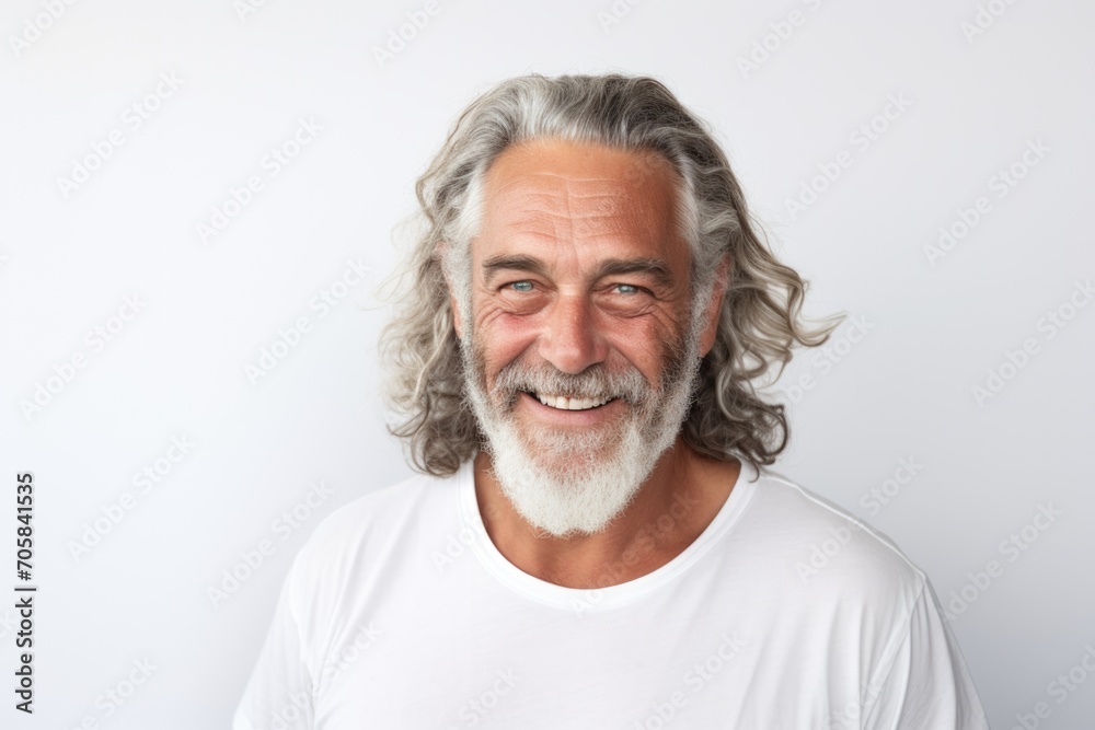 Smiling portrait of a bearded middle aged man on white background Smiling portrait of a bearded middle aged man on white background