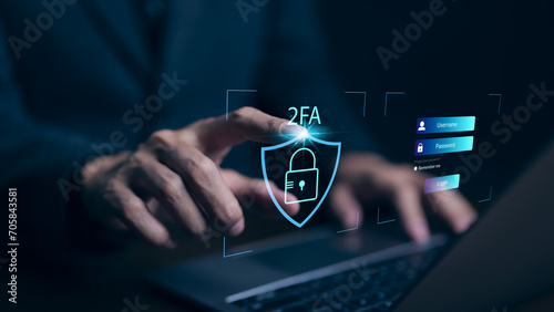 Privacy protect data and cybersecurity concepts. The two factor authentication laptop computer screen displays 2FA. Data protection with 2FA increases security. Log in with a username and password.