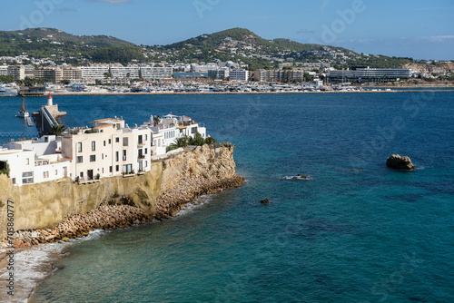 Romantic backstreet, side street and alleys in historic old town of Ibiza Stadt, Balearic Island with historic Mediterranean style architecture facades, a landmark sightseeing tourist spot in downtown photo