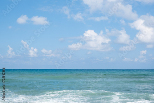 cloudy sky over the Mediterranean Sea horizon. The sea's waves magical tranquil seascape