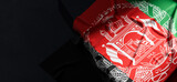Flag of Afghanistan. Fabric textured Afghanistan flag isolated on dark background. 3D illustration