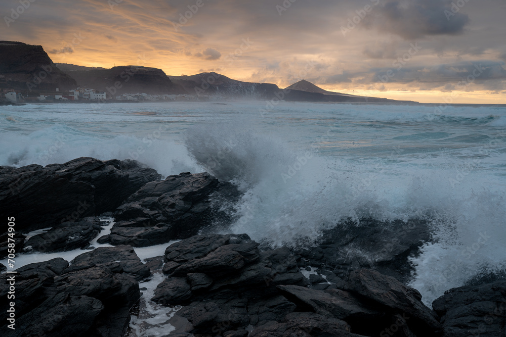 Quintanilla beach seascape at sunset with big waves. Arucas. Gran Canaria. Spain