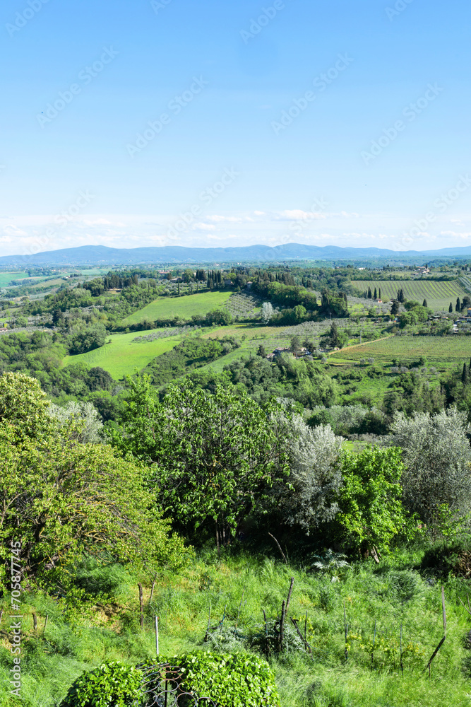 Panoramic beautiful rural landscape of Toscana. Green fields and meadows, countryside in Italy