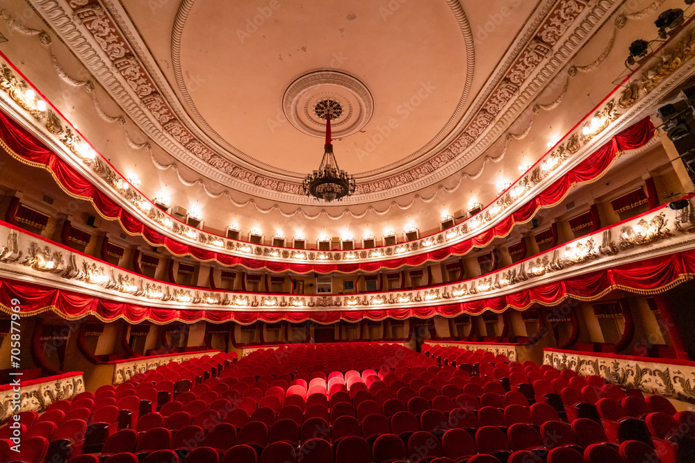 Obraz premium Red concert comfortable audience. Old fashion theatre interior.