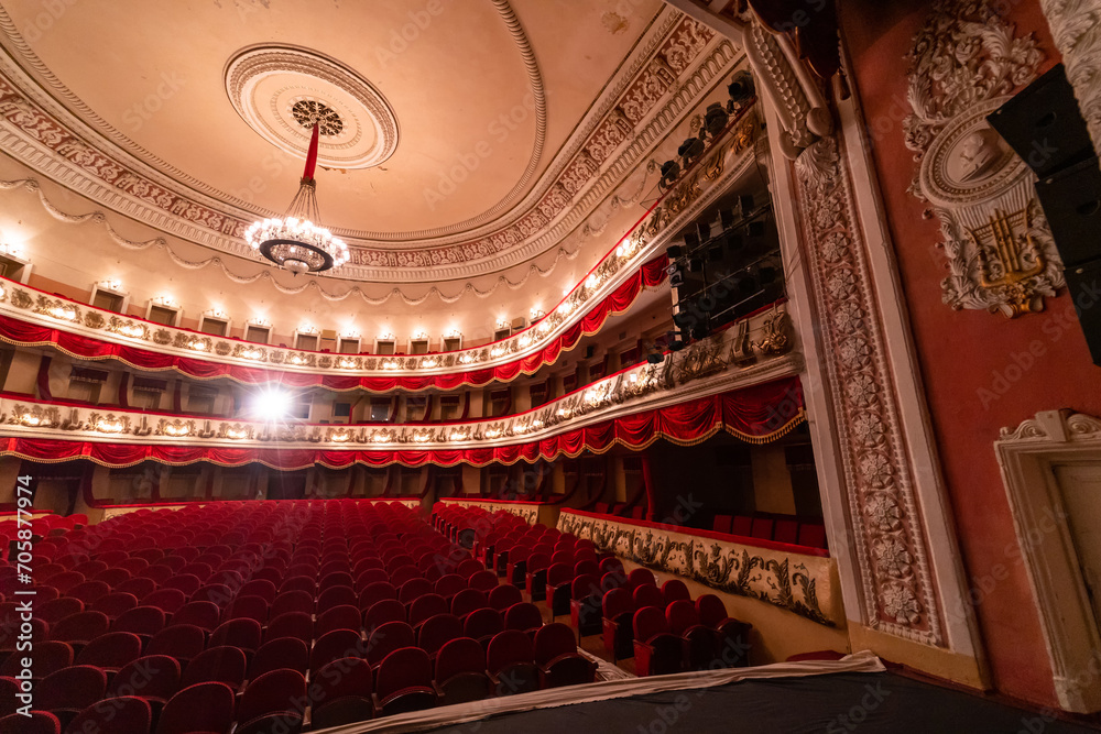 Obraz premium Old fashion theatre interior. Red concert comfortable audience.