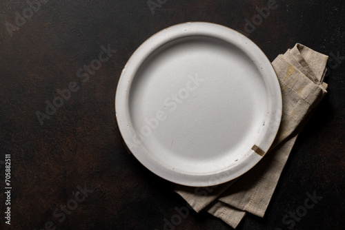 Mockup for a delicious meal. Empty plate on a table