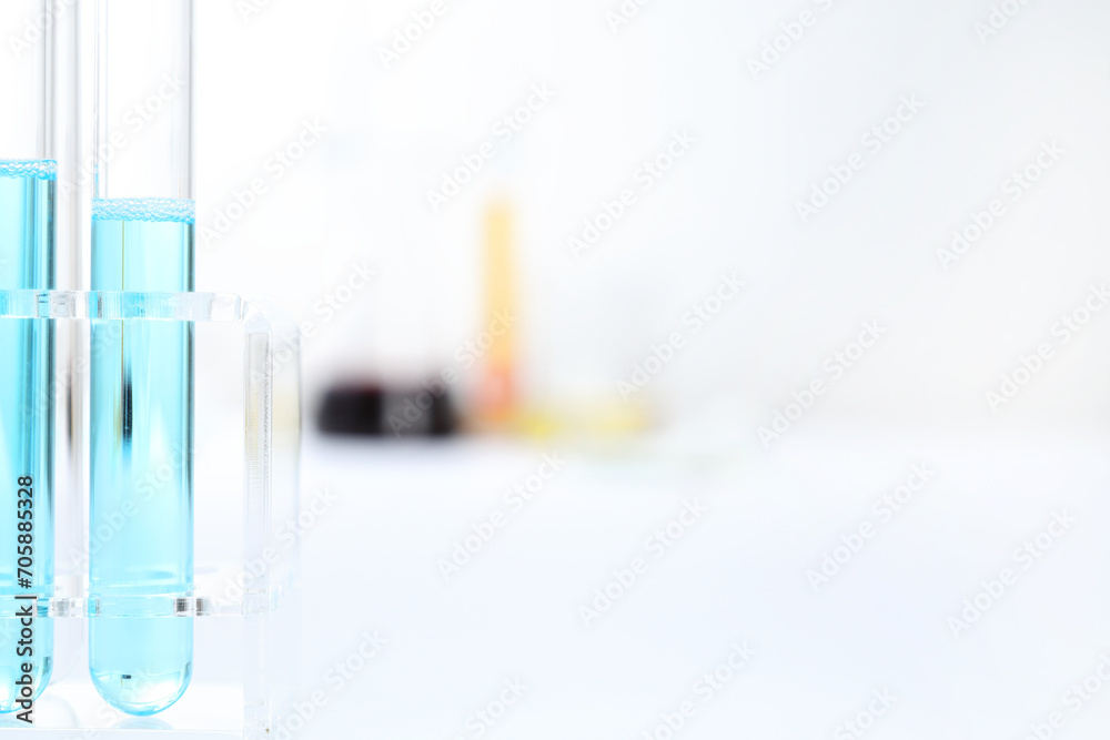 Laboratory equipment on a laboratory table on a white background during the experiments Laboratory equipment on a laboratory table on a white background during the experiments