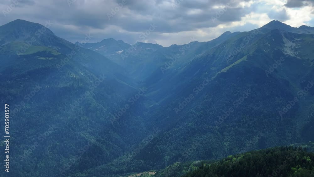 View of the mountain range near Mount Zakan. The top of the mountain node of the western part of the main ridge of the Greater Caucasus. Zakan Peak is the beginning of the Magisho mountain range. 4К View of the mountain range near Mount Zakan. The top of the mountain node of the western part of the main ridge of the Greater Caucasus. Zakan Peak is the beginning of the Magisho mountain range. 4К