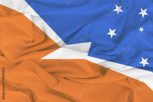 Flag of Tierra del Fuego Province Argentina, Fabric flag of Tierra del Fuego Province Argentina. Fabric and Texture Flag Image of Tierra del Fuego Province Argentina. photo