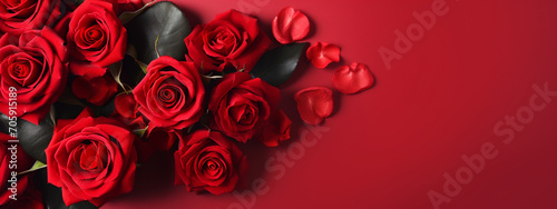 Red roses on a red background.