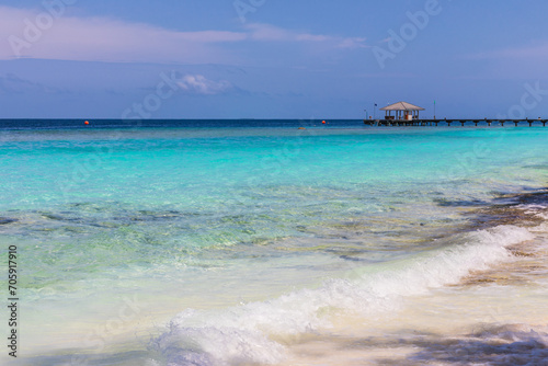 Azure water in the lagoon of the tropical island in the Maldives