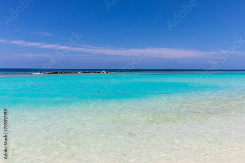 Azure water in the lagoon of the tropical island in the Maldives © dadamira