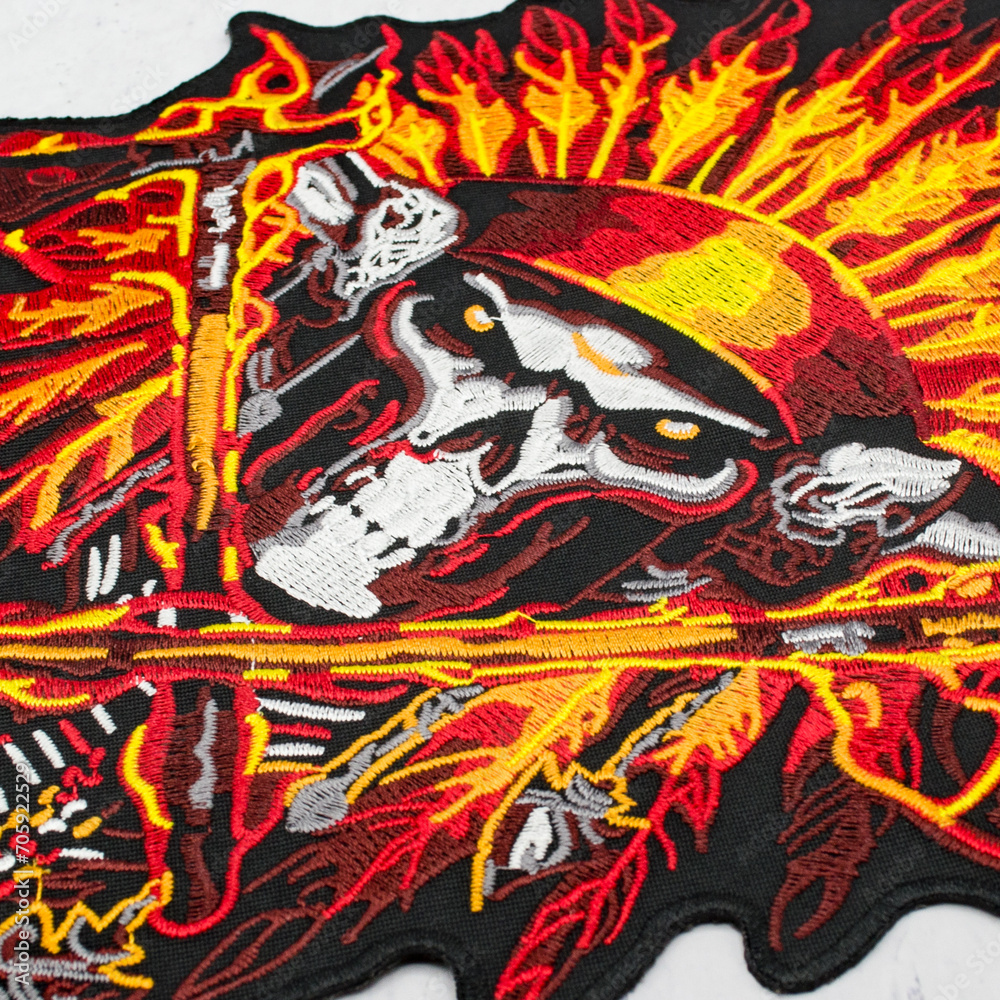 Embroidered patch burning skull of an Indian chief. Accessory for rockers, metalheads, punks, goths.