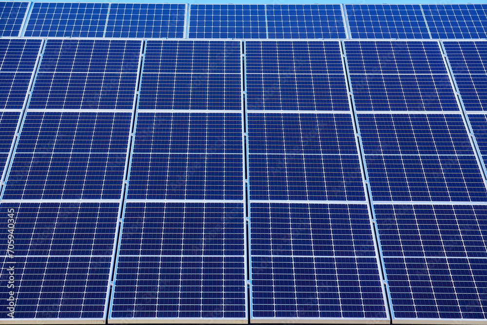 Solar panels on small wood board domestic house roof, sustainable energy concept. Solar panels on small wood board domestic house roof, sustainable energy concept.