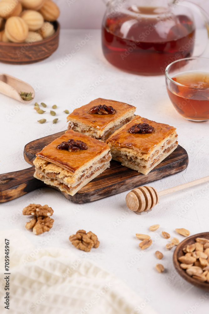 homemade cakes baklava nuts and tea on the table in the house in the early morning homemade cakes baklava nuts and tea on the table in the house in the early morning