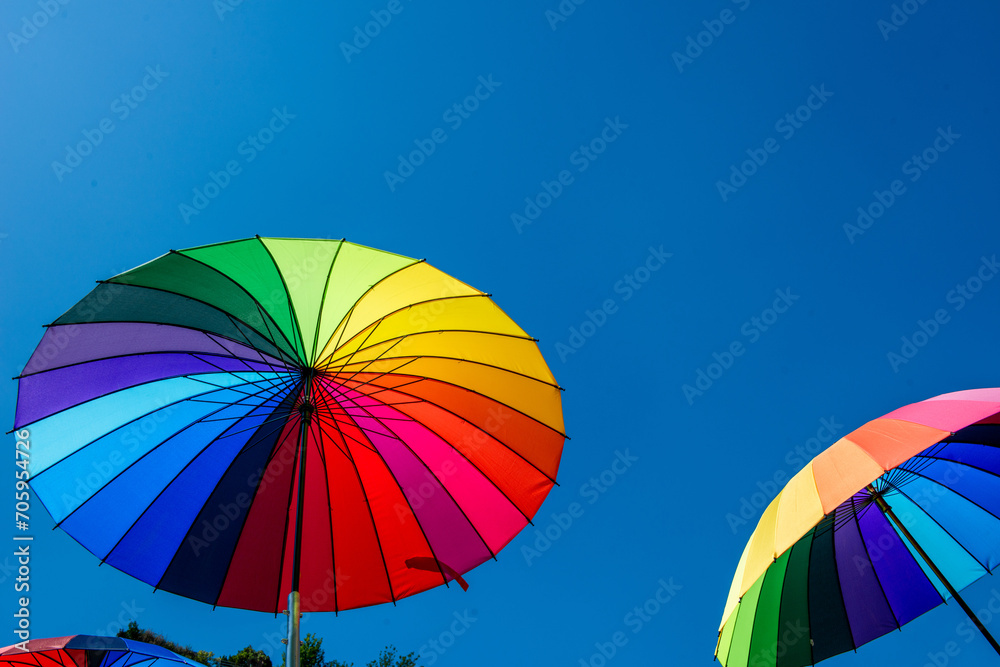 Umbrellas with the colors of the rainbow Umbrellas with the colors of the rainbow