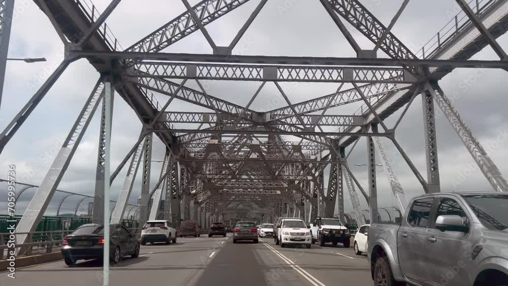 Traffic on Story Bridge Brisbane Queensland Australia.It's a heritage-listed steel cantilever bridge spanning Brisbane River carries an average of 97,000 vehicles each day. Traffic on Story Bridge Brisbane Queensland Australia.It's a heritage-listed steel cantilever bridge spanning Brisbane River carries an average of 97,000 vehicles each day.