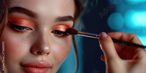 Makeup artist applies eye s...