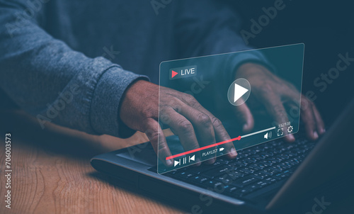 Businessman watching live multimedia video content streaming for online business. Video streaming on internet concept, Live digital stream multimedia player, Marketing technology and advertising. photo
