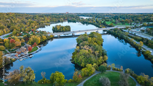 Aerial Autumn Riverside with Bridge and Marina in Michigan